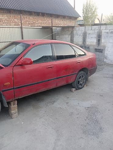 gac aion s цена: Mazda 626: 1993 г., Бензин, Седан — 7