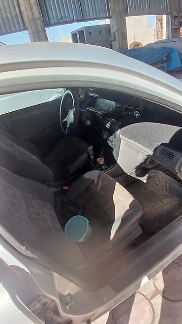 карбюратор на муравей: Mazda Cronos: 1993 г., 1.8 л, Механика, Бензин — 8