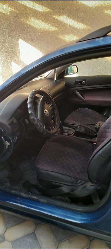 Volkswagen Passat: 1999 г., 1.8 л, Кол менен иштөөчү, Бензин, Универсал — 4