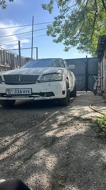 буфер спринтер: Nissan Laurel: 2000 г. — 6