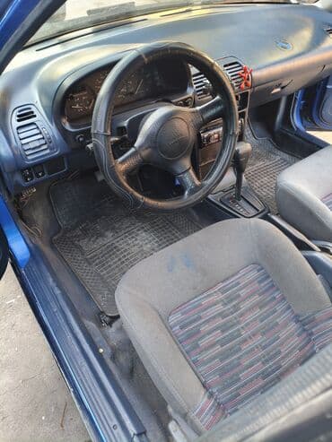 шины дордой: Mazda 323: 1989 г., 1.6 л, Автомат, Бензиновая, Хэтчбэк — 17