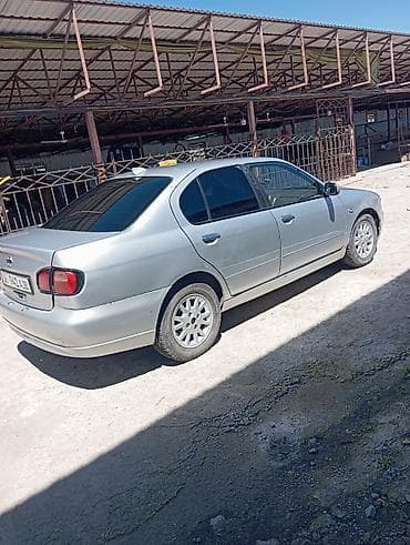 ваз 1: Nissan Primera: 2001 г., 1.8 л, Механика, Бензин, Седан — 2