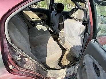 chery fora: Мицубиси Харизма 1996 года объем 1,8 кузов хетчбэк, бордовый цвет — 4