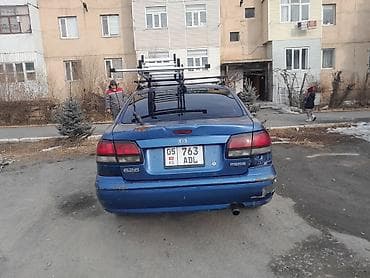 диска кия: Mazda 626: 1999 г., 2 л, Ручные, Бензин, Хэтчбэк — 4