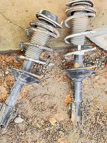 sg 5: Передний амортизатор Subaru 2003 г. — 1