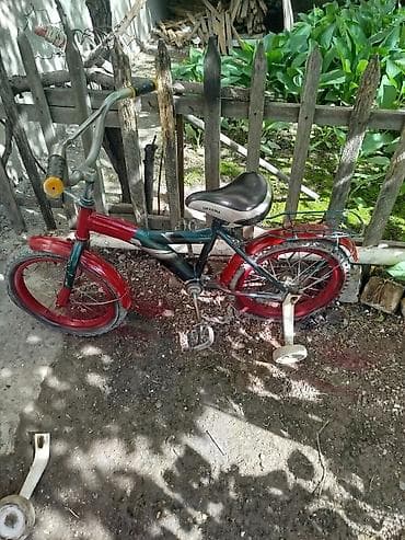 биксы одежда: Детский велосипед с дополнительными боковыми колесами — 1