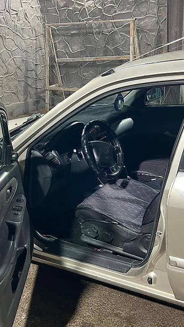 глушитель москвич: Mazda 626: 1999 г., 1.8 л, Механика, Газ — 5