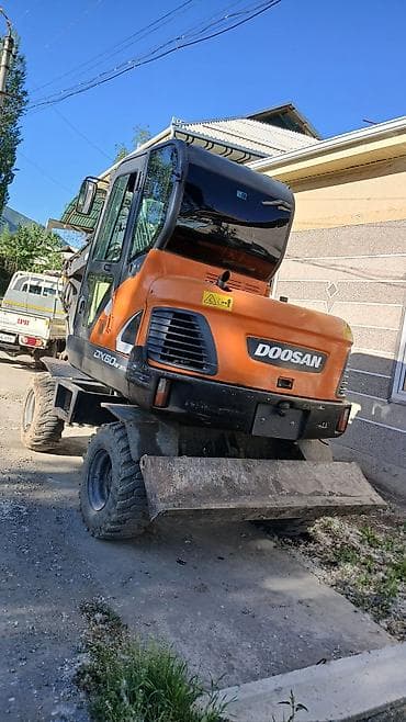 мотоцикл каракол: Экскаватор, Doosan, Дөңгөлөктүү — 6
