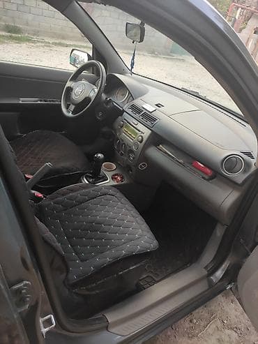 mazda 2: Mazda 2: 2003 г., 1.4 л, Робот, Бензин, Хэтчбэк — 2