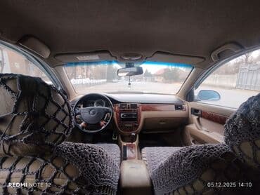 шины для погрузчиков: Chevrolet Lacetti: 2003 г., Бензиновая, Седан — 5