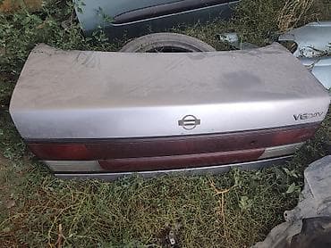 e star: Крышка багажника Nissan, Б/у, Оригинал — 1