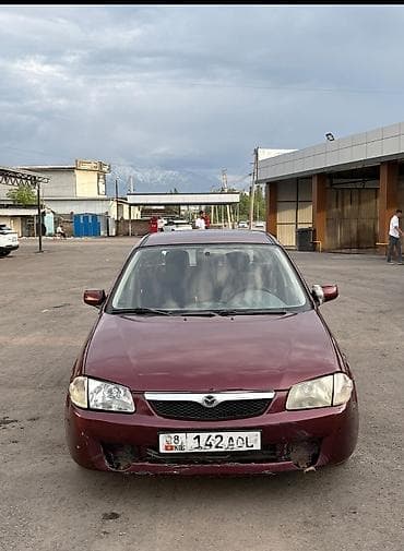 Mazda Familia: 1998 г., 1.5 л, Механика, Бензин, Универсал