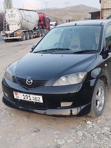 Mazda Demio: 2003 г., 1.5 л, Автомат, Бензин, Хэтчбэк