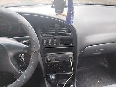 Транспорт: Kia Sephia: 1998 г., 1.5 л, Механика, Бензин, Седан — 10