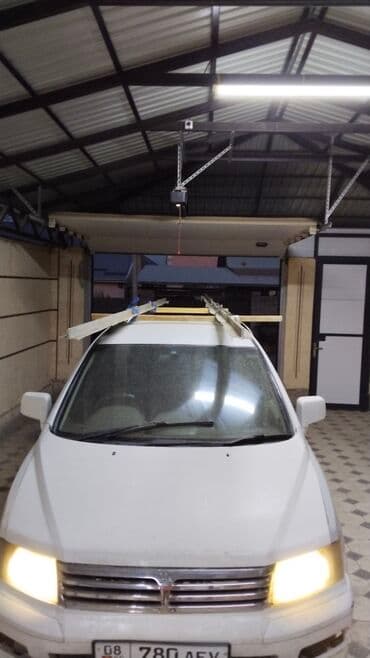 авто делика: Mini : 1998 г., 2.4 л, Автомат, Бензиновая, Минивэн — 3