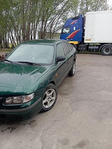 диски на форд фокус 1: Mazda 626: 1997 г., Седан — 3