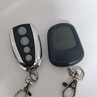 установка батарея: Копирование брелоков для ворот, роль ставней, шлагбаумов. и др — 8