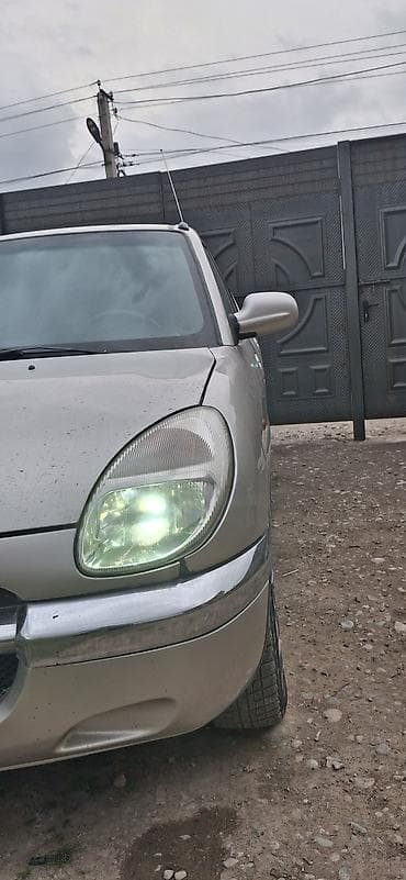 аварийный знак: Daihatsu Sirion: 2000 г., 1 л, Ручные, Бензин, Хэтчбэк — 5