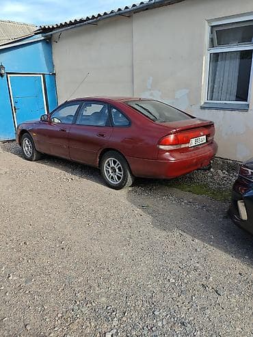 полки на авто: Mazda 626: 1993 г., Лифтбек — 2