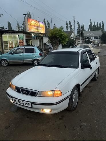 Daewoo Nexia: 1994 г., 1.5 л, Кол менен иштөөчү, Газ, Седан — 9