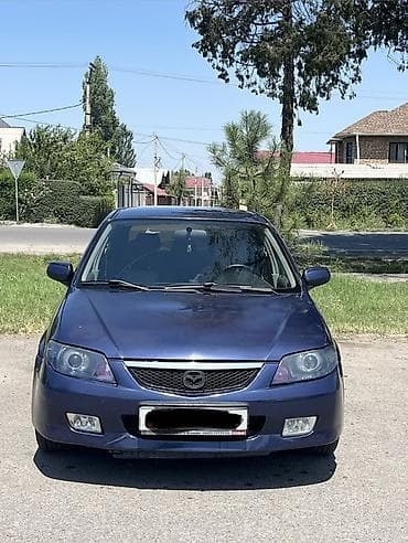 Mazda 323: 2003 г., 1.6 л, Механика, Газ, Универсал