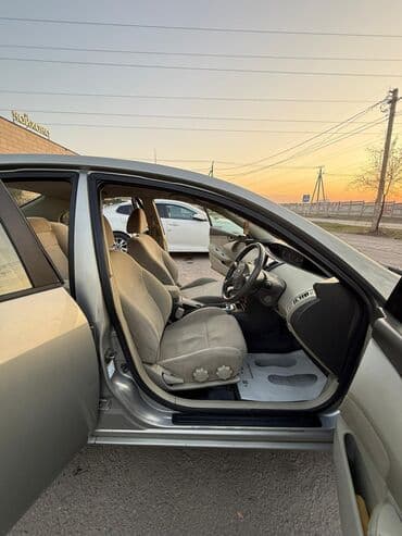 оригинальные штампованные диски опель: Nissan Primera: 2003 г., 2 л, Автомат, Бензиновая, Седан — 11