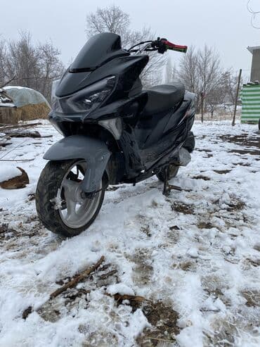 Скутеры: Скутер/максискутер спортивного стиля - Агрессивный дизайн передней — 5