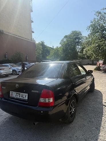 e klass: Mazda 323: 2002 г., 1.5 л, Автомат, Бензин, Седан — 3