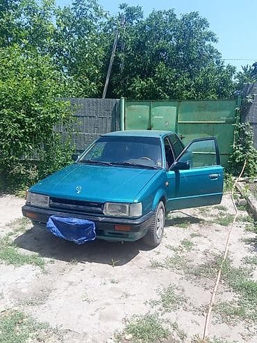 электр авто: Mazda 323: 1986 г., 1.5 л, Кол менен иштөөчү, Бензин, Седан — 8