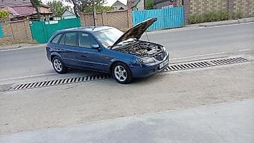 rd 1: Mazda 323: 2003 г., 1.6 л, Механика, Бензин, Универсал — 2