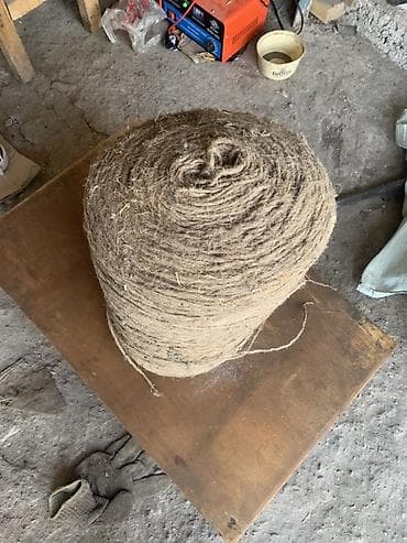 джутовый коврик: Джутовый канат (бечёвка) в большой промышленной бухте. - Материал — 2