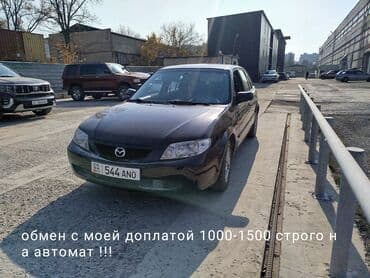 полик нексия 2: Mazda 323: 2003 г., Механика, Бензиновая, Универсал — 1
