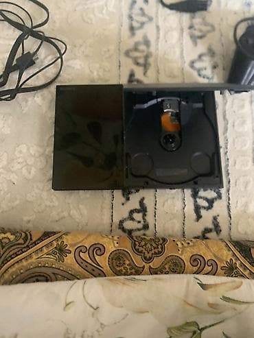 Sony PlayStation 2 Slim (чёрная) Комплектация: - консоль PS2 Slim с at lalafo.kg Sony PlayStation 2 Slim (чёрная) Комплектация: - консоль PS2 Slim с