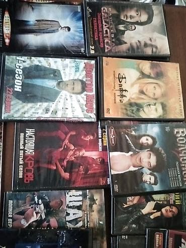 Велоаксессуары: Диски для просмотра фильмов на ДВД, 5 сом за один, забрать можно будет — 2