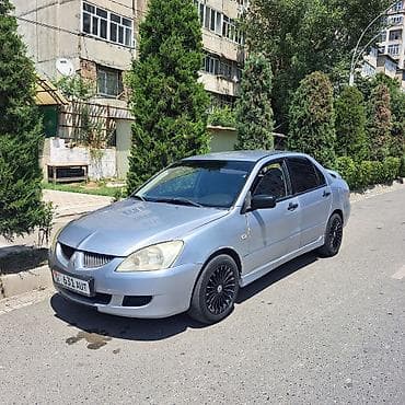 g comp: Mitsubishi Lancer: 2003 г., 1.3 л, Механика, Бензин, Седан — 2