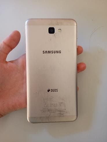 Смартфон Samsung Galaxy J7 (серия J, DUOS), цвет золотой. 16 Гб памяти