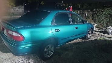 трёхколесный мотоцикл: Mazda 3: 1997 г., 1.6 л, Автомат, Бензин, Седан — 6