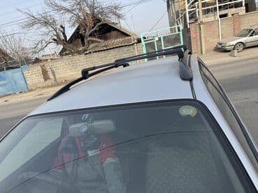 багажник для субару: Поперечные дуги На рейлинги — 9