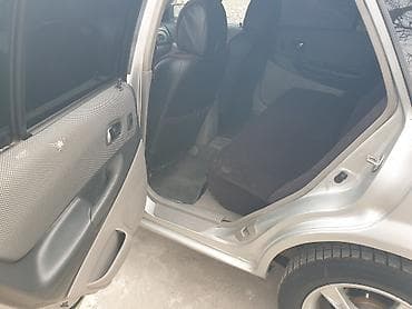 Транспорт: Mazda 323: 2003 г., 1.6 л, Автомат, Бензин, Лифтбек — 7