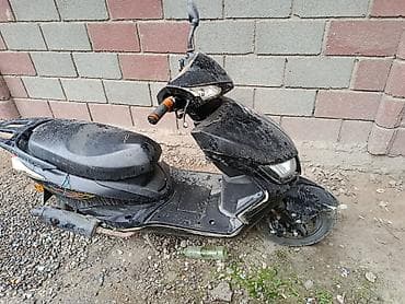 Скутер 50 см³, автомат (вариатор), 2-тактный карбюраторный двигатель