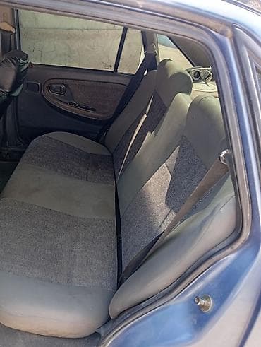 обшивки нексия: Daewoo Nexia: 2006 г., Механика, Бензин, Седан — 4