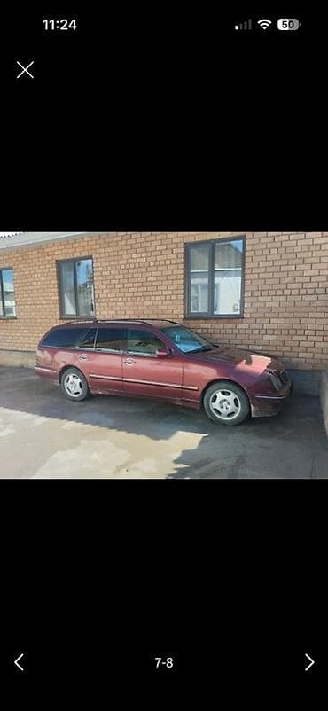 крыло на степ: Универсал бизнес‑класса в редком бордовом цвете. Кузов — пятидверный — 1