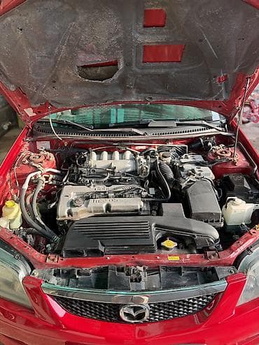 rx 7: Mazda 323: 2002 г., 1.6 л, Механика, Бензин, Хэтчбэк — 8
