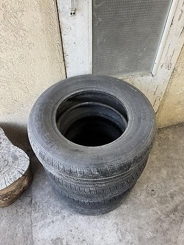 летний колесо: Комплект из 4 автомобильных шин. Характеристики: - Размер: 195/70 R14 — 2