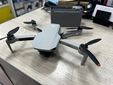 Фото жана видеокамералар: Б/У DJI Mini 2 — ультралёгкий складной квадрокоптер с камерой 4K — 3