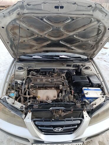 авто салона: Hyundai Elantra: 2003 г., 1.6 л, Автомат, Бензин, Седан — 10