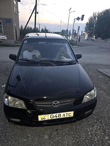 Унаа сатуу: Mazda Demio: 2002 г., Кол менен иштөөчү, Хетчбек — 2