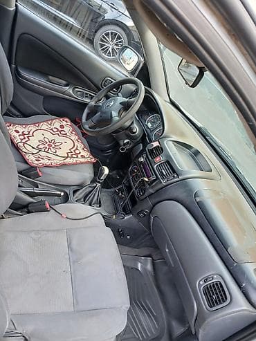 фонари бишкек: Nissan Almera: 2004 г., 1.8 л, Механика, Газ, Седан — 5