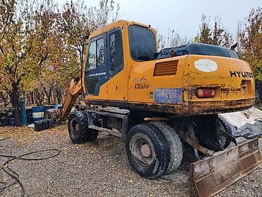 audi b4: Экскаватор, Hyundai, 2001 г., Колесный — 2