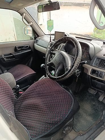 daihatsu core: Mitsubishi Pajero iO: 1999 г., 2 л, Механика, Бензин, Внедорожник — 1
